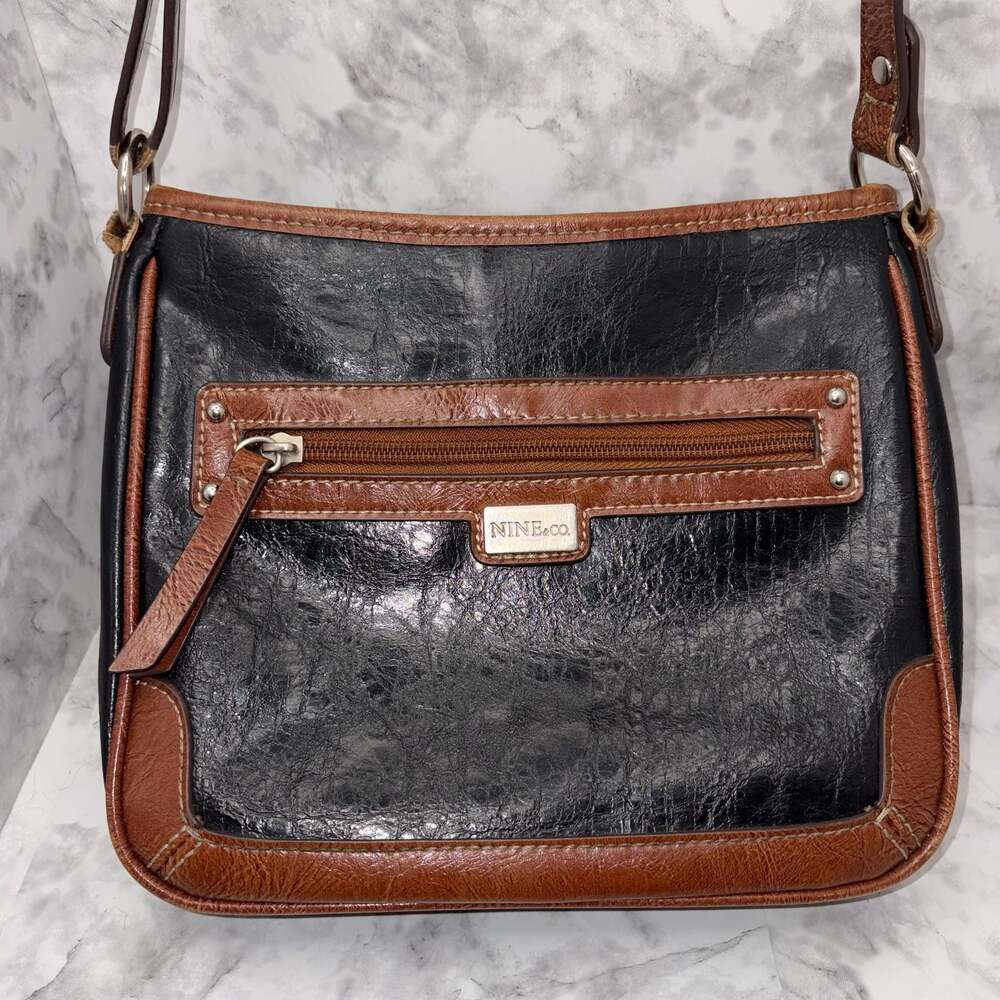 Vintage Nine & Co. Black and Brown Faux Leather Crossbody